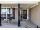 Inviting front porch with seating, decorative accents, and a welcoming entrance at 3037 Knobstone Ln, Indianapolis, IN 46203