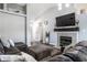 Spacious living room featuring a fireplace, comfortable seating, and an inviting ambiance at 3037 Knobstone Ln, Indianapolis, IN 46203