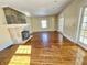 Bright living room with fireplace and hardwood floors at 3236 Central Ave, Indianapolis, IN 46205