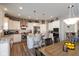 Well-equipped kitchen with an island, stainless appliances, plenty of cabinets, and seamless access to the dining area at 3629 S Meadows Ln, New Palestine, IN 46163