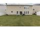 The backyard has a spacious lawn perfect for outdoor activities and entertaining at 387 Legacy Blvd, Greenwood, IN 46143
