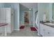 Bathroom features a shower, soaking tub, vanity, and neutral paint at 387 Legacy Blvd, Greenwood, IN 46143