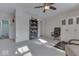 Bedroom featuring a bookshelf, a ceiling fan, and natural light from a window at 387 Legacy Blvd, Greenwood, IN 46143