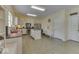 Bright kitchen with white cabinets, stainless steel appliances, and a functional center island at 387 Legacy Blvd, Greenwood, IN 46143