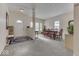 Inviting living room and dining area with neutral color, large windows, and great natural light at 387 Legacy Blvd, Greenwood, IN 46143