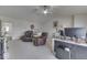 Bright main bedroom with comfortable seating, neutral decor, and large windows at 387 Legacy Blvd, Greenwood, IN 46143