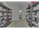 Bright storage room with shelving units and white doors at 387 Legacy Blvd, Greenwood, IN 46143