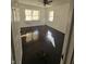 Bright bedroom featuring hardwood floors, ceiling fan, and natural light at 526 N Oxford St, Indianapolis, IN 46201