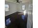 Bright bedroom with hardwood floors and natural light from two windows at 526 N Oxford St, Indianapolis, IN 46201