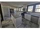 Stylish kitchen featuring stainless steel appliances, a large island, and granite countertops at 526 N Oxford St, Indianapolis, IN 46201