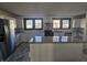 Modern kitchen with white cabinets, stainless steel appliances, and granite countertops at 526 N Oxford St, Indianapolis, IN 46201
