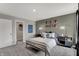 Bedroom with a bed, modern lighting, and a view into the closet at 5314 Pelion Pl, McCordsville, IN 46055
