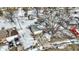 A cozy home featuring a two-car garage, complemented by a well-maintained lawn and mature trees at 5614 Personality Ct, Indianapolis, IN 46237