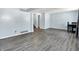 Finished basement offering vinyl flooring, open layout, and potential as a recreational area or additional living space at 5614 Personality Ct, Indianapolis, IN 46237