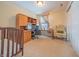 Bedroom or office with desk area, accent chair, and large window at 5638 Congressional Pl, Indianapolis, IN 46235