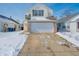 Charming two-story home with a two-car garage and a long driveway at 5638 Congressional Pl, Indianapolis, IN 46235