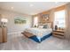 Spacious primary bedroom featuring plush carpet, ample natural light, and tasteful decor at 5879 Handbell Ln, Greenwood, IN 46143