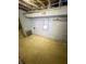 The basement features concrete floors, gray painted walls, and exposed piping at 638 W 30Th St, Indianapolis, IN 46208