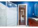Modern bathroom with glass shower enclosure, elegant vanity, and stylish fixtures at 671 State Road 267, Mooresville, IN 46158