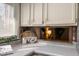 Kitchen features white cabinets, light countertops, decor and lots of lighting for a bright and airy feel at 671 State Road 267, Mooresville, IN 46158