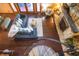 Lofted view of open-concept floor plan featuring living room with stone fireplace and comfortable seating at 671 State Road 267, Mooresville, IN 46158