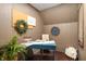 Inviting home office featuring wood paneling, cozy lighting, and a peaceful workspace at 671 State Road 267, Mooresville, IN 46158