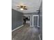 Open-concept space features new flooring and a view into the adjacent kitchen at 724 E Beecher St, Indianapolis, IN 46203