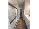 Modern bathroom featuring sleek, black fixtures, a stylish shower, and white cabinetry at 7367 Broadview Ln, McCordsville, IN 46055