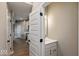 Hallway with tile flooring, and views into the kitchen and bathroom at 7367 Broadview Ln, McCordsville, IN 46055