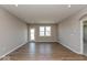Bright living room featuring hardwood floors, recessed lighting, and neutral paint, creating a welcoming atmosphere at 7367 Broadview Ln, McCordsville, IN 46055