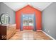 Bedroom featuring vaulted ceiling, window, hardwood flooring and modern dresser at 7415 Chapel Villas Dr # D, Indianapolis, IN 46214
