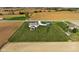 Picturesque aerial view of a home on a large lot with a pool, shed, and well-kept lawn at 8225 W 825 N, Thorntown, IN 46071
