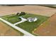 Expansive property with a well-maintained home, outbuilding, and surrounding green space at 8225 W 825 N, Thorntown, IN 46071