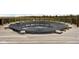 A backyard pool is shown covered on a wood deck enclosed with wood railings at 8225 W 825 N, Thorntown, IN 46071