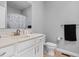 Bathroom featuring a vanity with light countertops, a toilet and a shower/tub at 8225 W 825 N, Thorntown, IN 46071