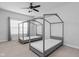 A spacious bedroom with two modern, house-frame beds at 8225 W 825 N, Thorntown, IN 46071