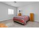 Cozy bedroom with a bed, matching nightstands, and a large window at 8225 W 825 N, Thorntown, IN 46071