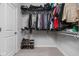 Organized walk-in closet with shelves and hanging space for clothes and storage at 8225 W 825 N, Thorntown, IN 46071