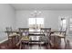 Cozy dining area with rustic wood table, seating for six, and a view of the outdoor patio at 8225 W 825 N, Thorntown, IN 46071