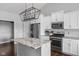 Modern kitchen featuring stainless steel appliances, granite countertops, an island, and recessed lighting at 8225 W 825 N, Thorntown, IN 46071