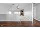 Open living room design with hardwood floors, carpet, and a fireplace feature at 8225 W 825 N, Thorntown, IN 46071