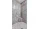 Stylish walk-in shower with gray tiling and decorative mosaic accents at 8225 W 825 N, Thorntown, IN 46071