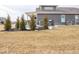 Well-maintained backyard with lush greenery, decorative landscaping, and a lovely patio area for relaxation at 8660 Hudson Way, Brownsburg, IN 46112