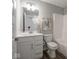 Contemporary bathroom with a white vanity, granite countertop, and a bathtub and shower combination at 8660 Hudson Way, Brownsburg, IN 46112