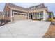 Charming single-Gathering home with attached two-car garage and long concrete driveway at 8660 Hudson Way, Brownsburg, IN 46112