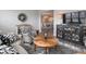 Bright living room with elegant decor, and an open view to the dining area at 8660 Hudson Way, Brownsburg, IN 46112