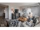 Comfortable living room with a decorative cabinet, wooden table and plush seating at 8660 Hudson Way, Brownsburg, IN 46112