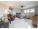 Spacious main bedroom features a ceiling fan, carpet, and large windows for ample natural light at 8660 Hudson Way, Brownsburg, IN 46112
