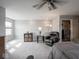 The main bedroom features a ceiling fan, with carpet and ample space for relaxation at 8660 Hudson Way, Brownsburg, IN 46112