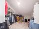 Organized walk-in closet with built-in shelving and plenty of hanging space at 8660 Hudson Way, Brownsburg, IN 46112